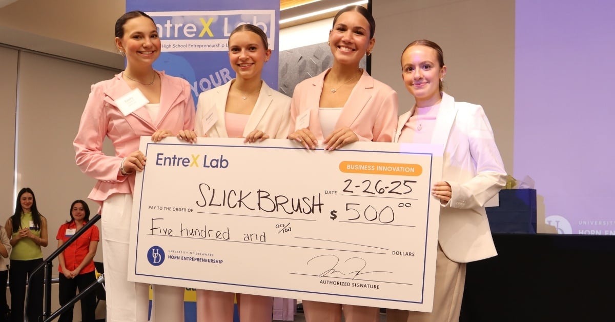 2025 EntreX Regional Slick Brush team on stage