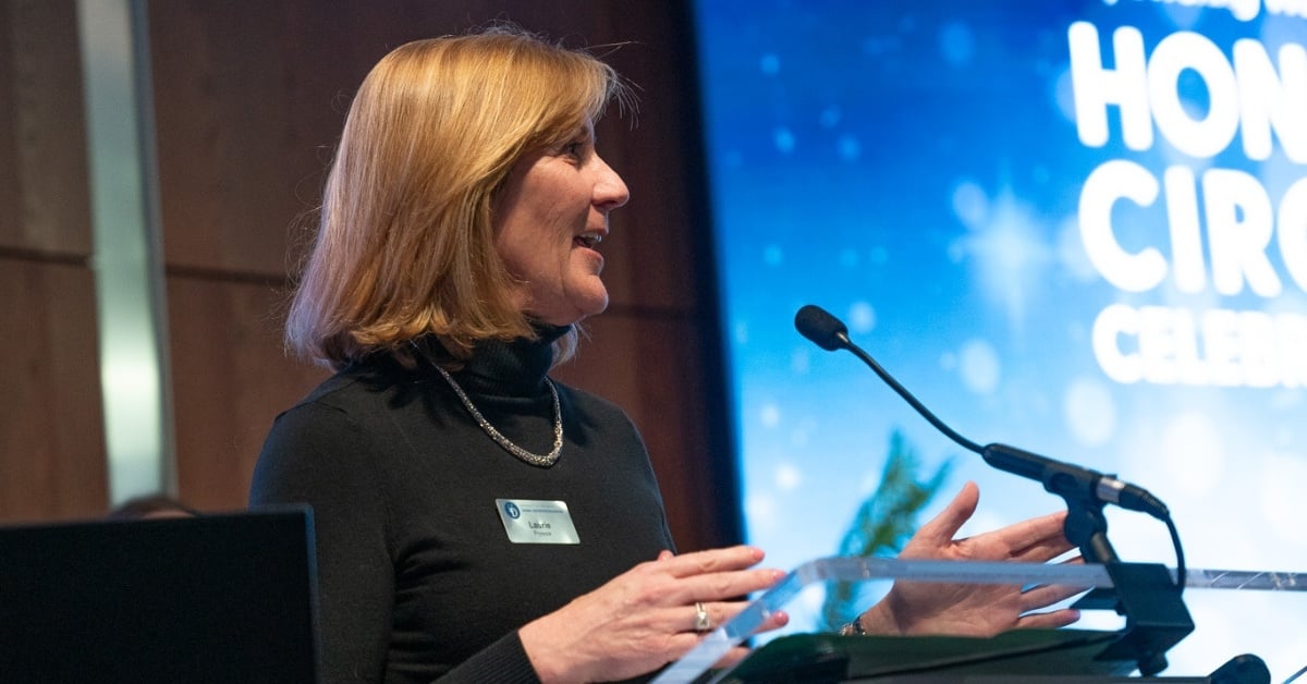 Laurie Prysock speaking at the podium