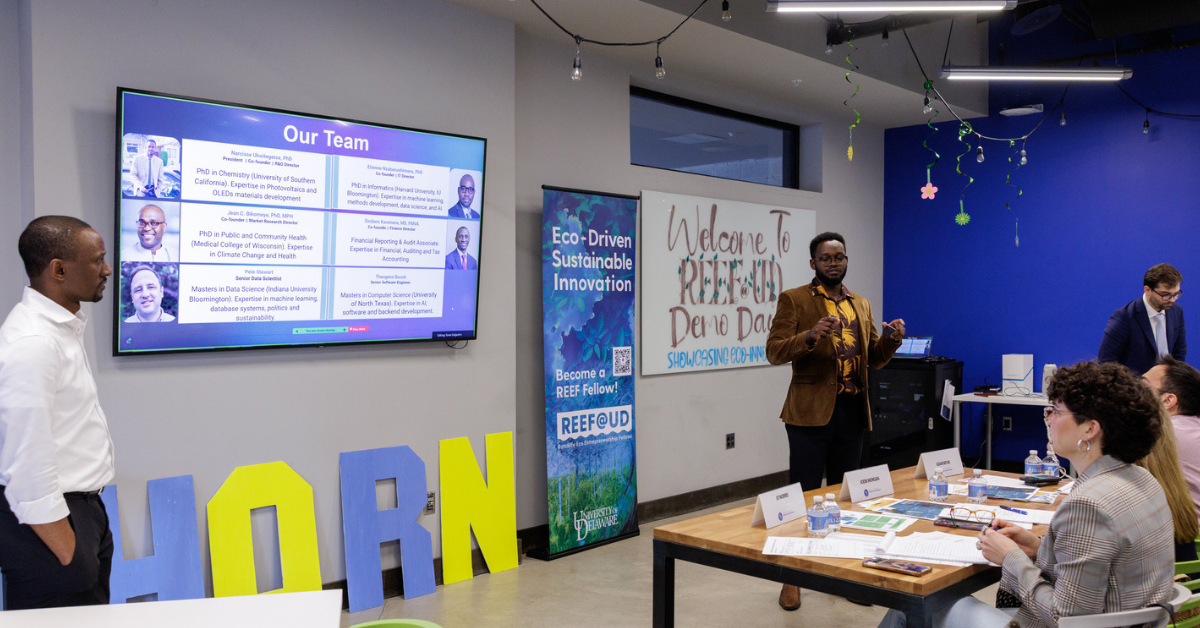 2025 REEF Demo Day students pitching to judges